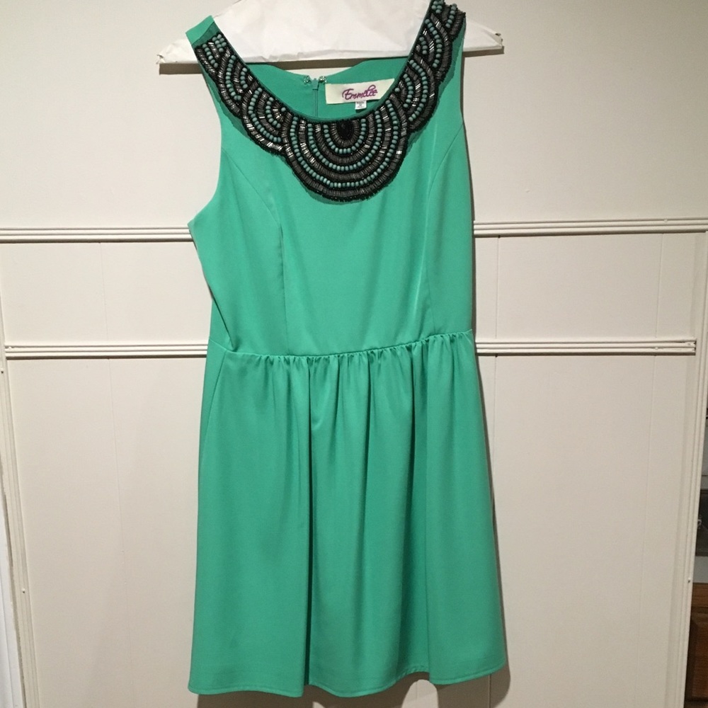 Green dress with beaded neckline